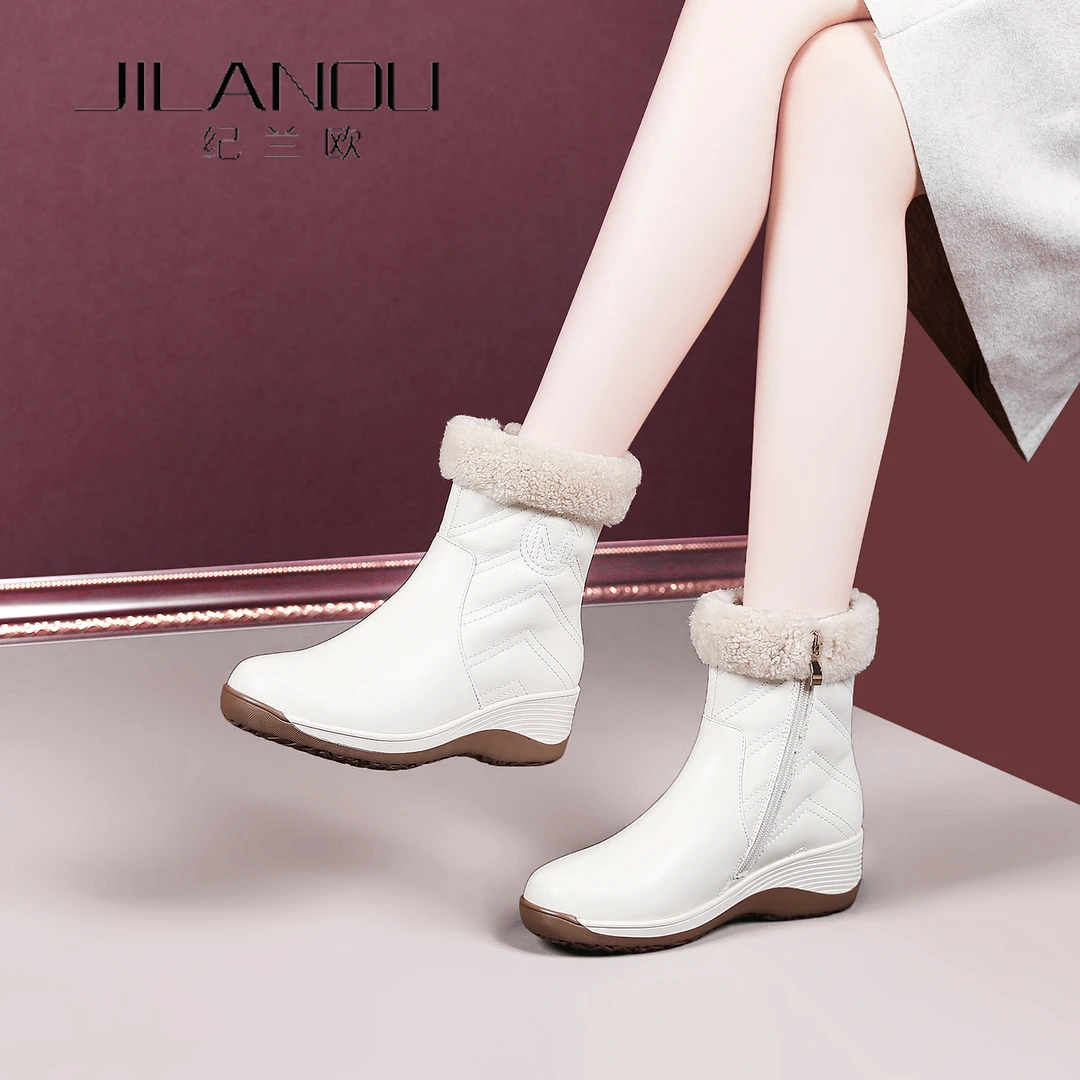 羊毛一体中筒雪地靴女2025冬季新款女鞋加绒保暖短靴厚底真皮靴子