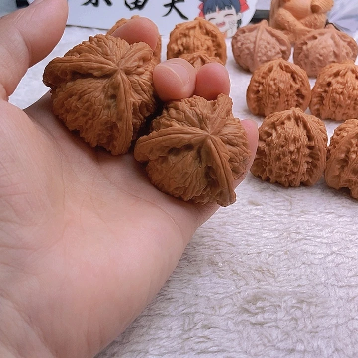 文玩核桃把件搁***?三棱