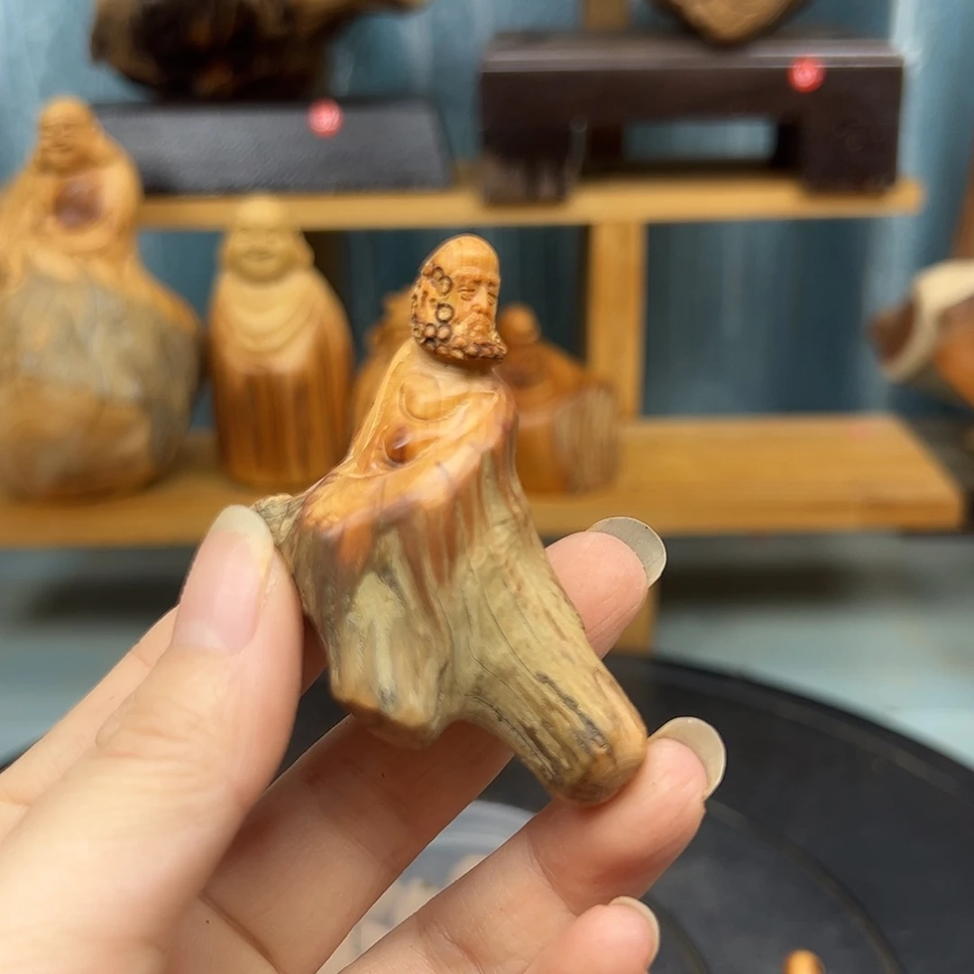 木阿****寻崖柏木摆件手把件