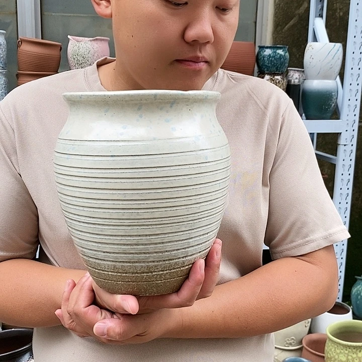 紫砂花盆口17高21瑕疵