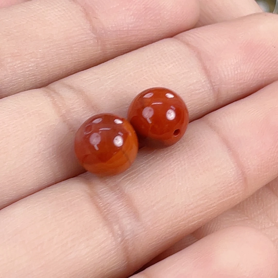 凌***点南红玛瑙未镶嵌瓦西牛血红双色单珠9（打包）