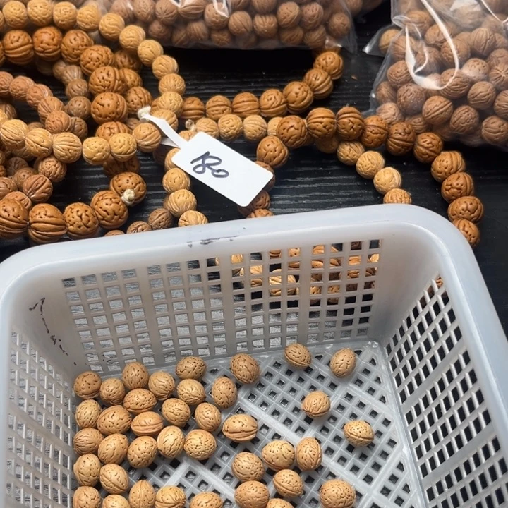 为***力文玩核桃手串小桃核散籽批发