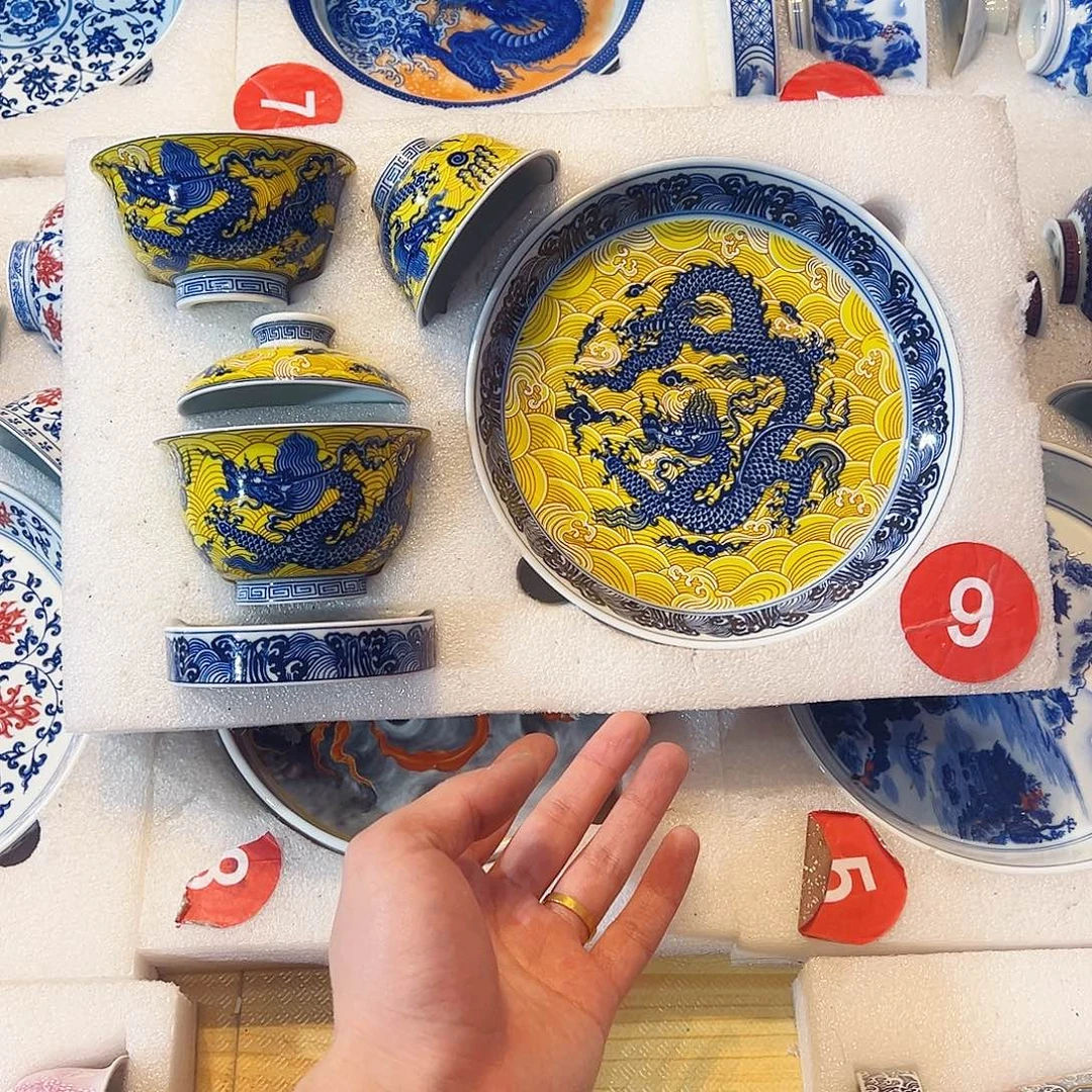 在***见黄釉海水龙纹五件套
