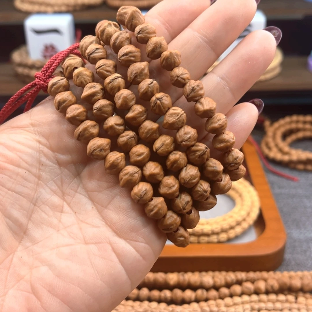 辉***哥吊坠柏香籽/百香籽原装横打