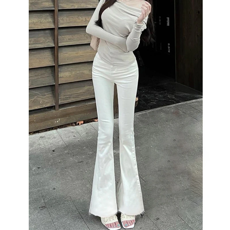 高腰显瘦显高毛边微喇牛仔裤女2025冬季新款白色单扣净版喇叭长裤