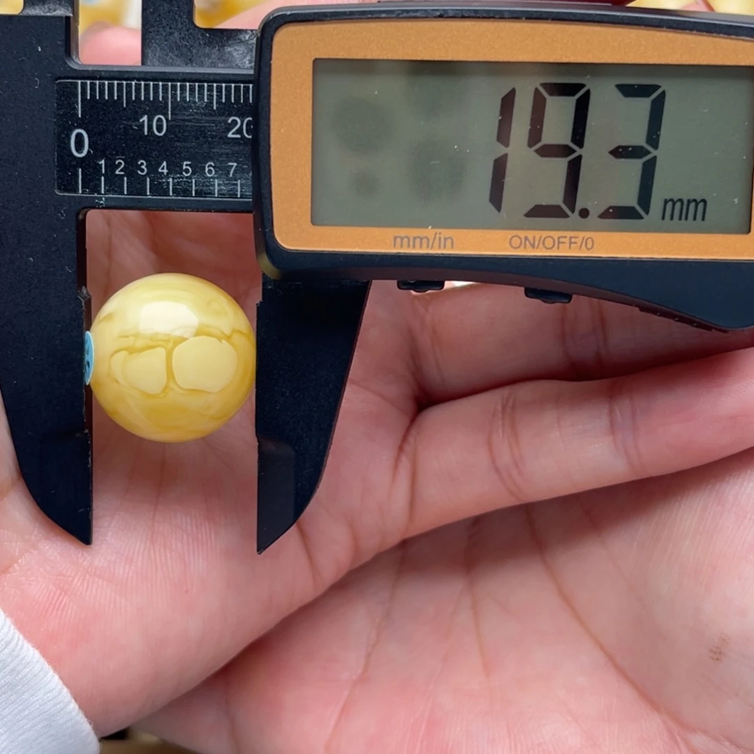 琥珀未镶嵌裸石蜜蜡圆珠笑