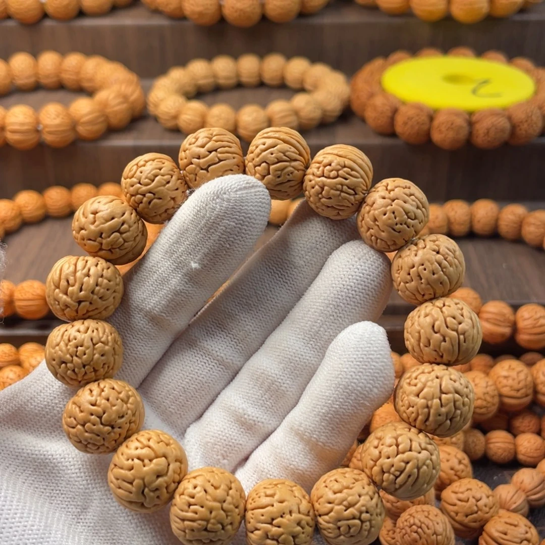 勤***天桃核吊坠肌肉苹果