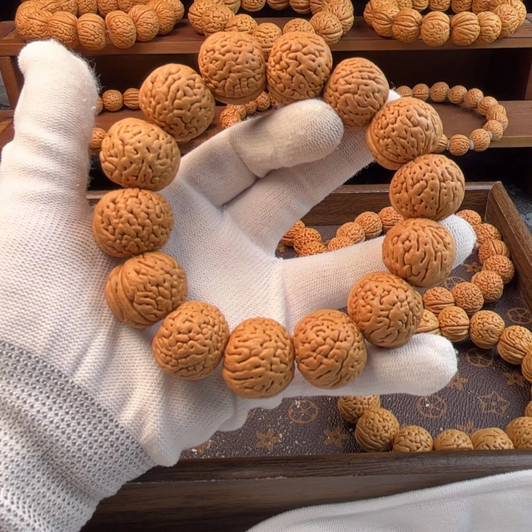 风***起桃核手串野生大肌肉