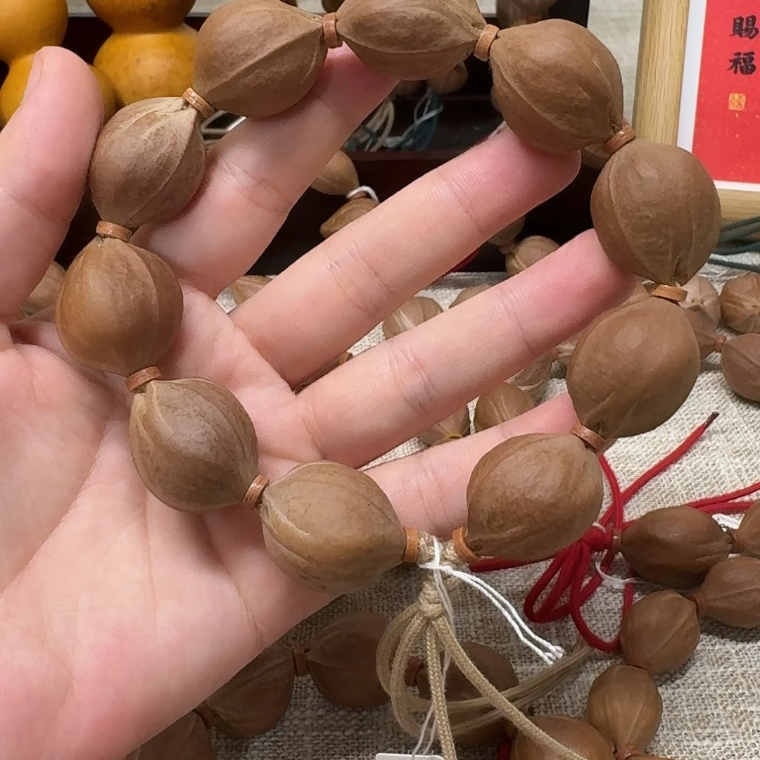 养***鱼吊坠橄榄核梅林铁核2126