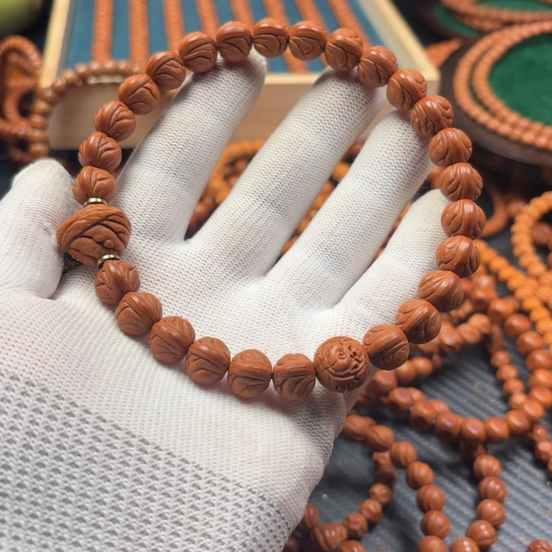 吊坠桃核玉龙脊手持