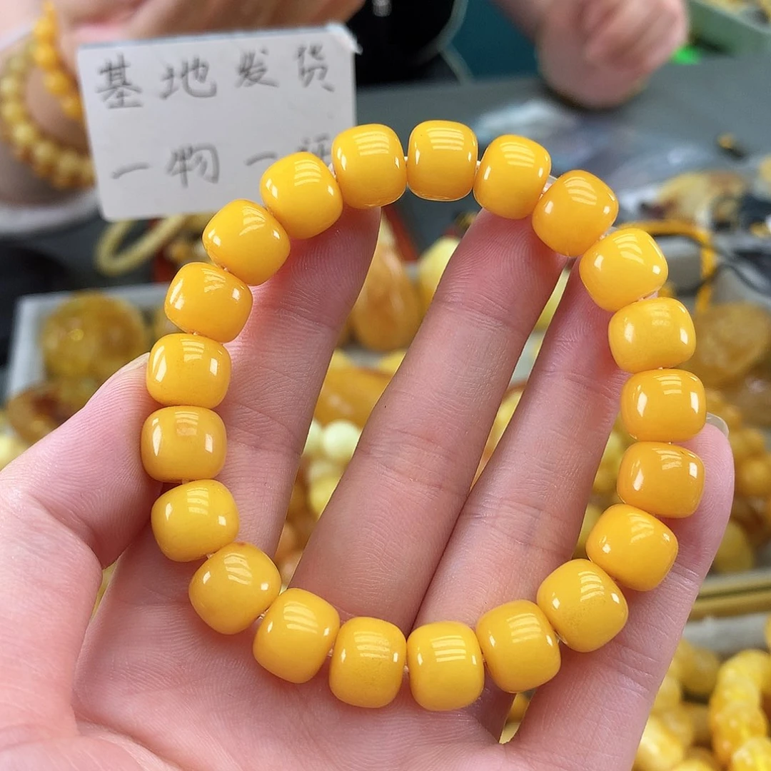 跃***姐未镶嵌琥珀裸石鸡油黄10