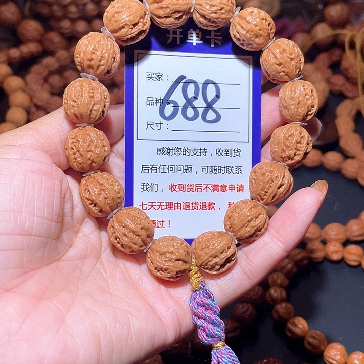 烈***宁688黄皮龙脊八棱核桃手串16+