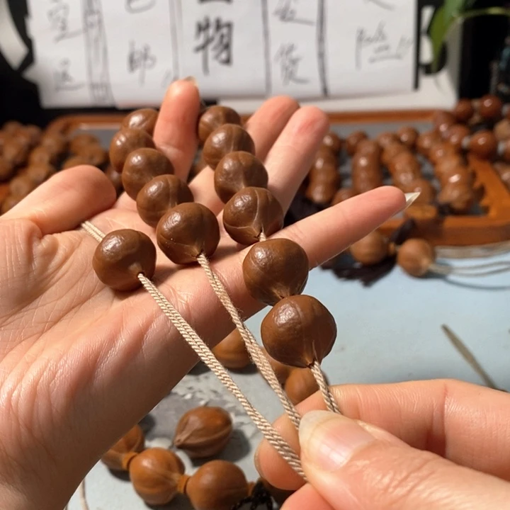 橄榄核手串0261精品蒜头铁核鸡血红12+1颗