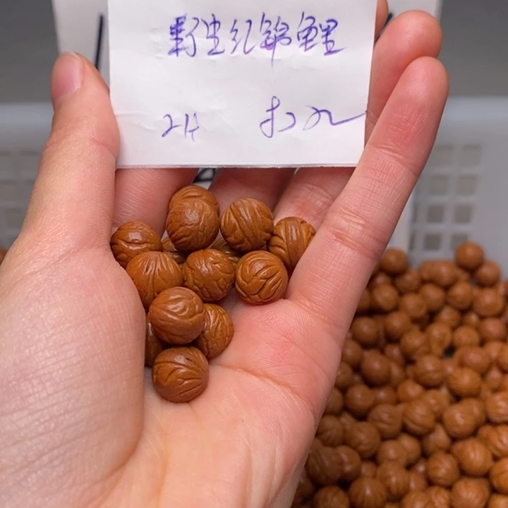 李***贺手串桃核11mm左右野生红锦鲤24颗（穿好）