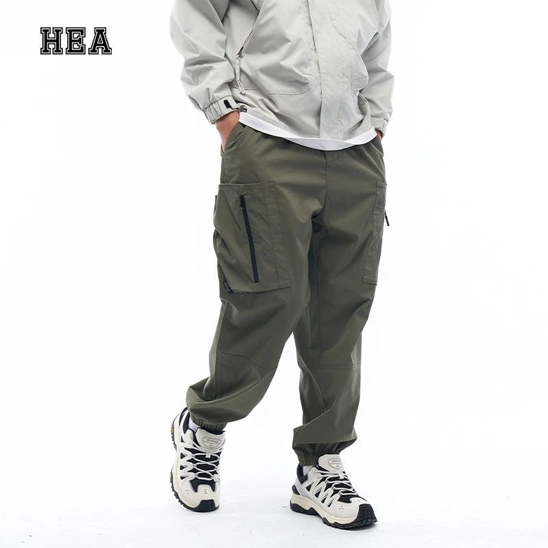 HEA 休闲裤运动风青少年加长裤子伞兵男裤工装风显高束脚裤情侣款