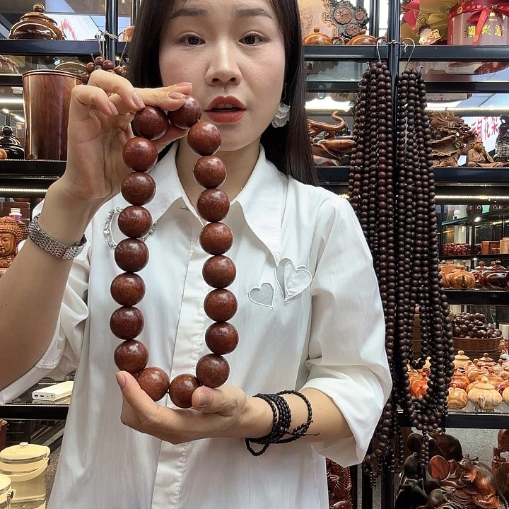 如***意缅甸花梨（花梨木类）2颗珠子