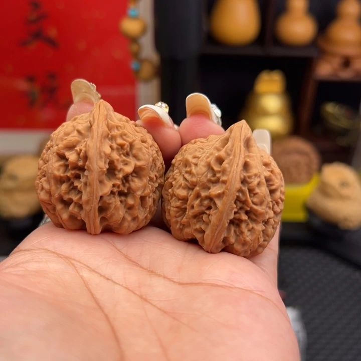 铁***柱文玩核桃吊坠牡丹纹