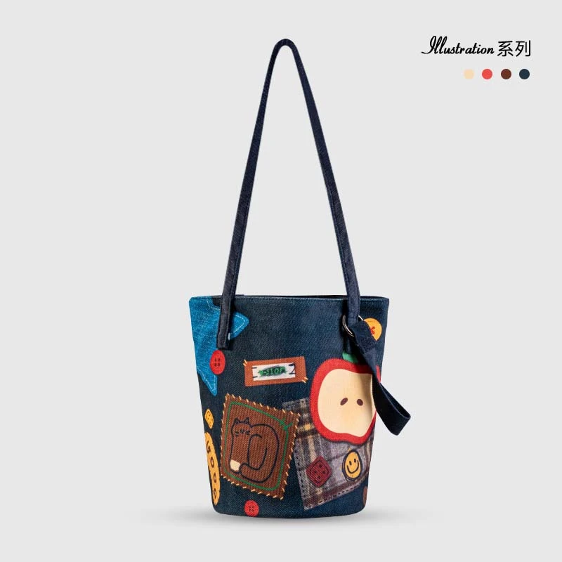 本立方蓝色牛仔拼接苹果平板包斜跨电脑包通勤帆布水桶包送斜挎带
