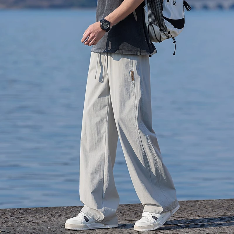 裤子男士2025新款潮牌冰丝速干休闲长裤男直筒宽松百搭阔腿运动裤
