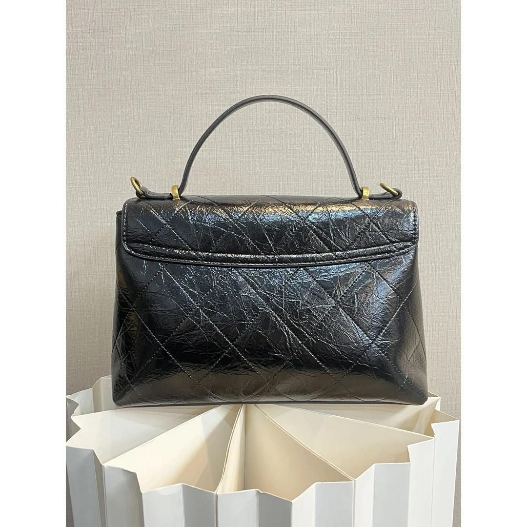 TOLEX2025新款手工时尚百搭梯形油腊手提女包黑色