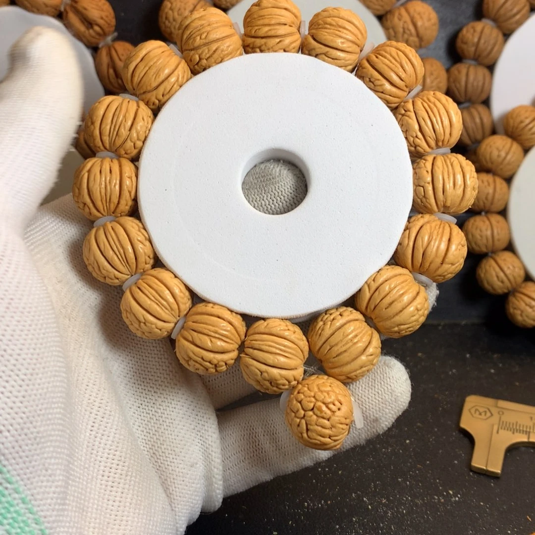 桃核手串16尺爆纹金丹