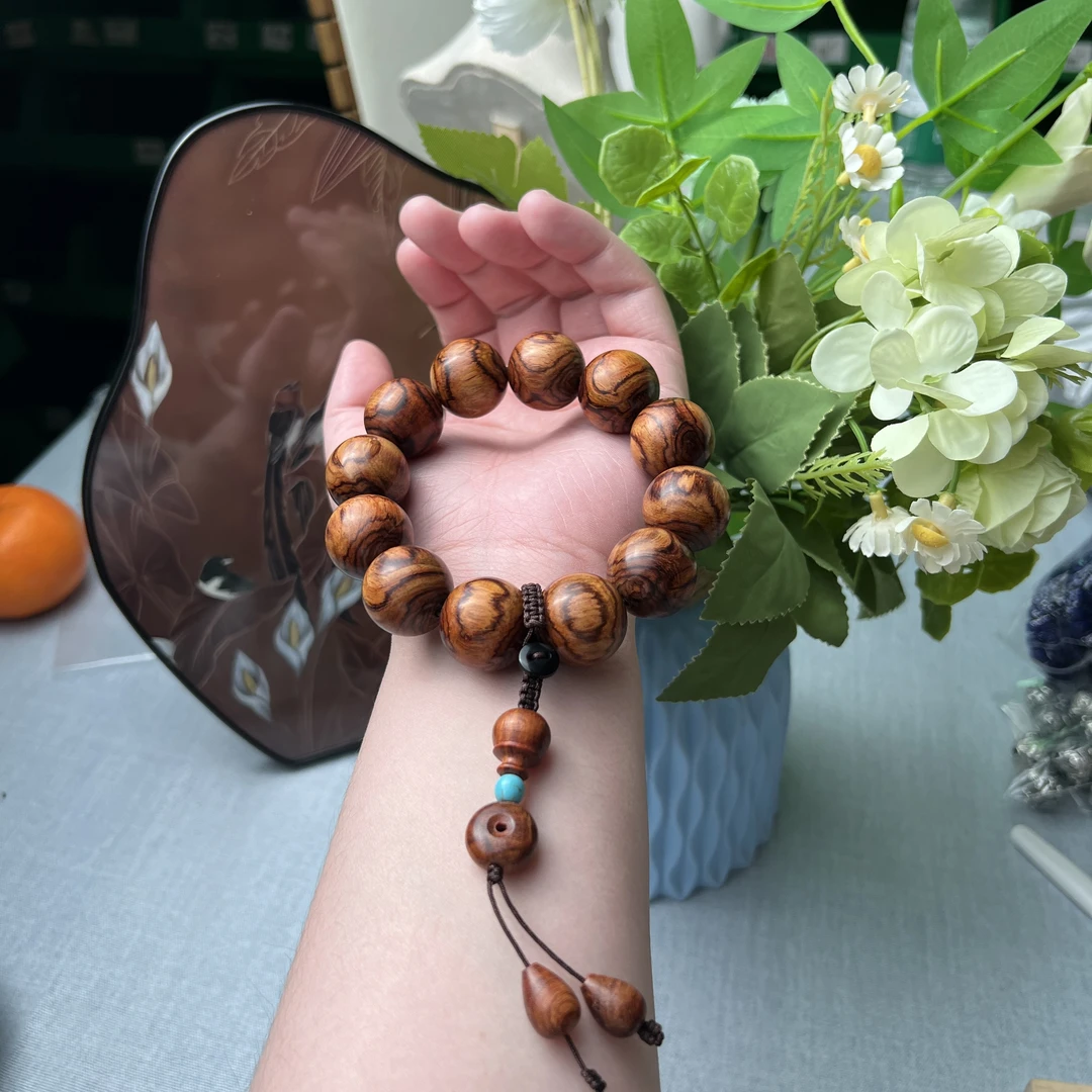 【珠宝厂长】【鬼脸对眼】约20mm海南黄花梨圆珠手串手持