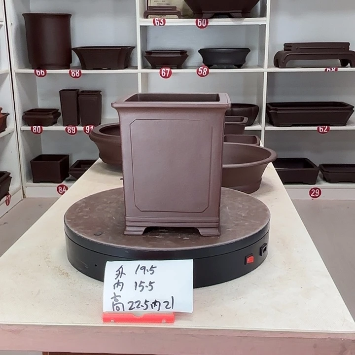 庆***幸紫砂花盆奎面千筒