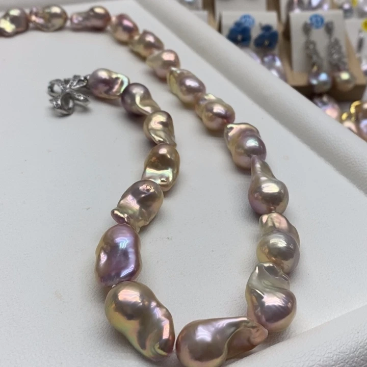 银S925镶嵌淡水珍珠耳饰何**乎