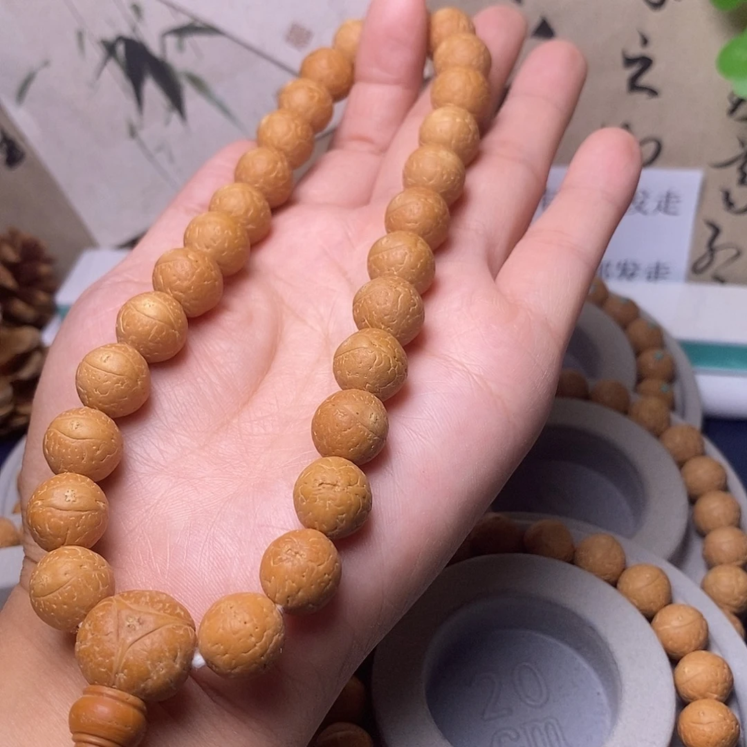 凤眼菩提吊坠12.5手持