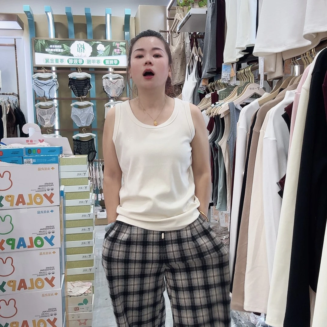 棉2538奶油杏背心