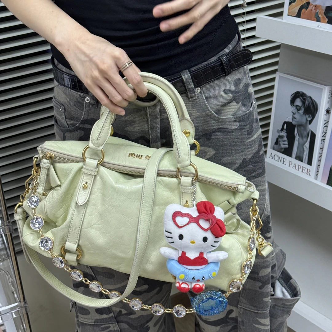 95新 MIU MIU/缪缪 新油蜡皮青感机车包