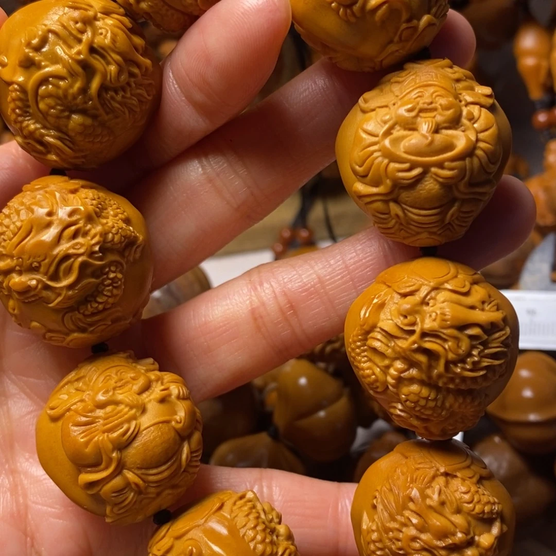 罗***尿橄榄核手串/手链九龙大财神