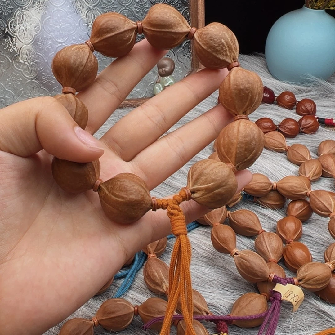 刘***～橄榄核手串梅林铁核2225素串鲨鱼背