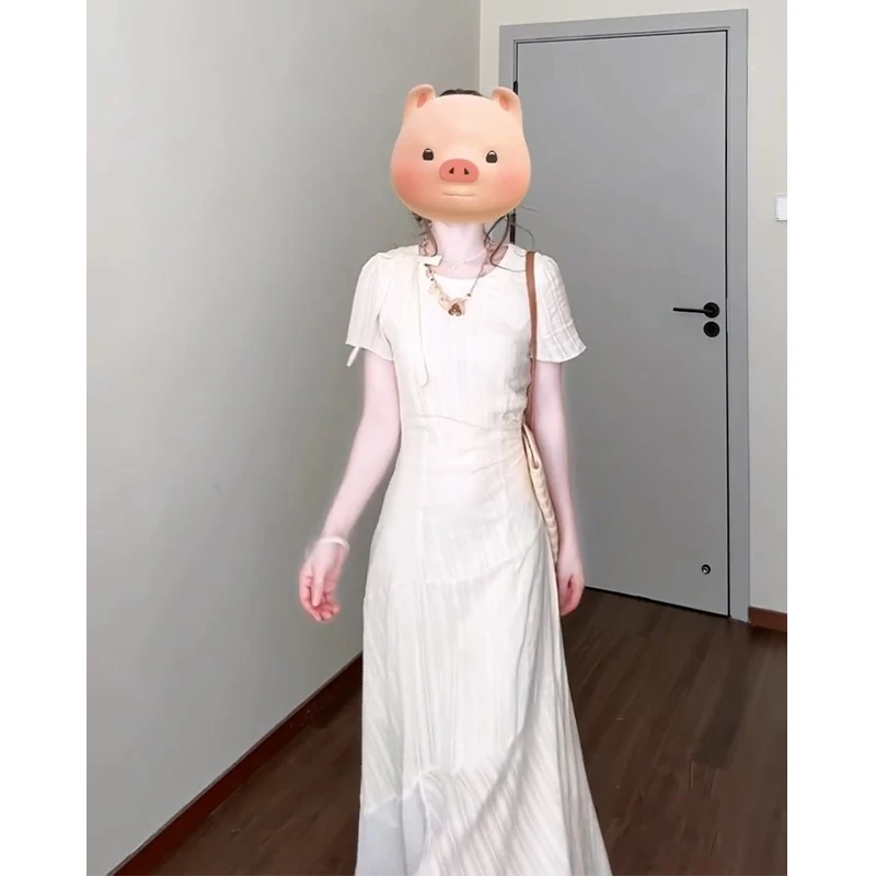 连衣裙2025夏季新款法式气质圆领不规则收腰显瘦蝴蝶结中长款裙子