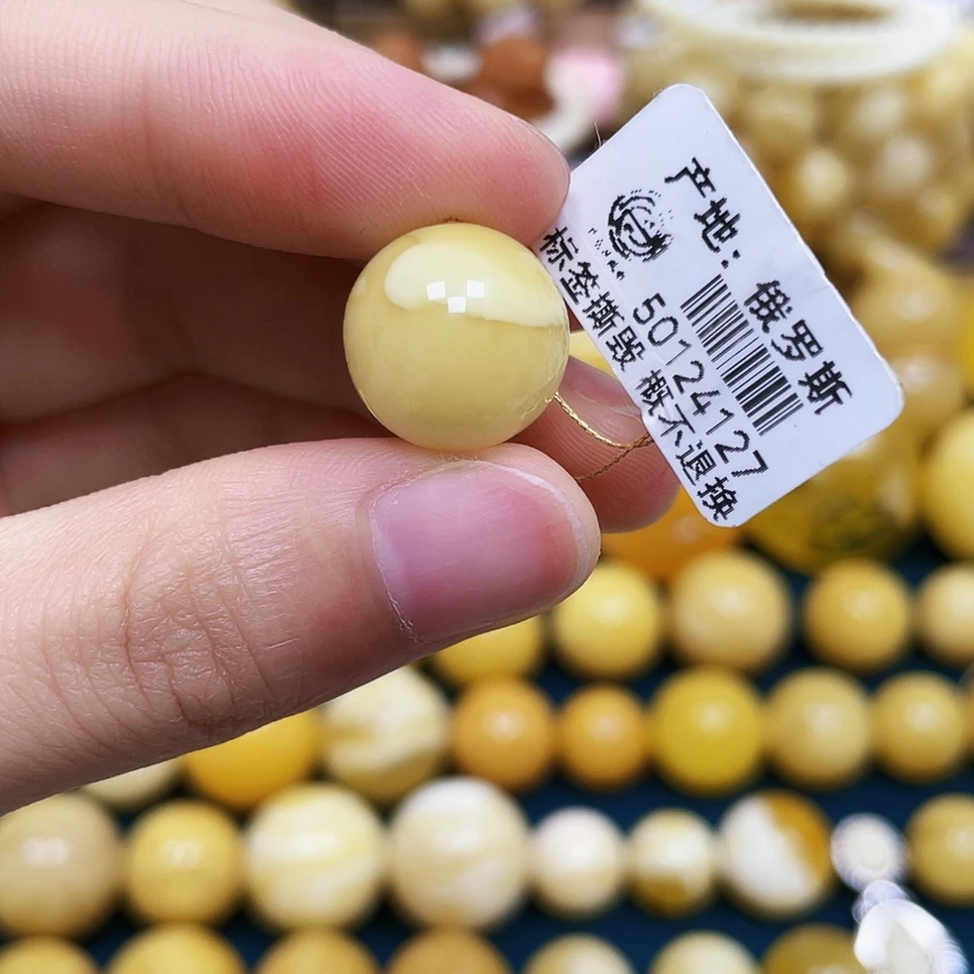 琥珀未镶嵌裸石14.4mm.瑕