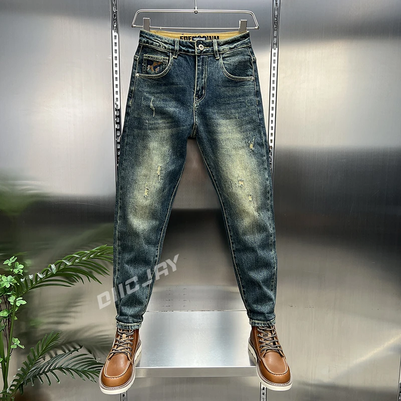 潮牌刺绣破洞补丁牛仔裤男秋冬新款复古水洗百搭时尚休闲微锥裤