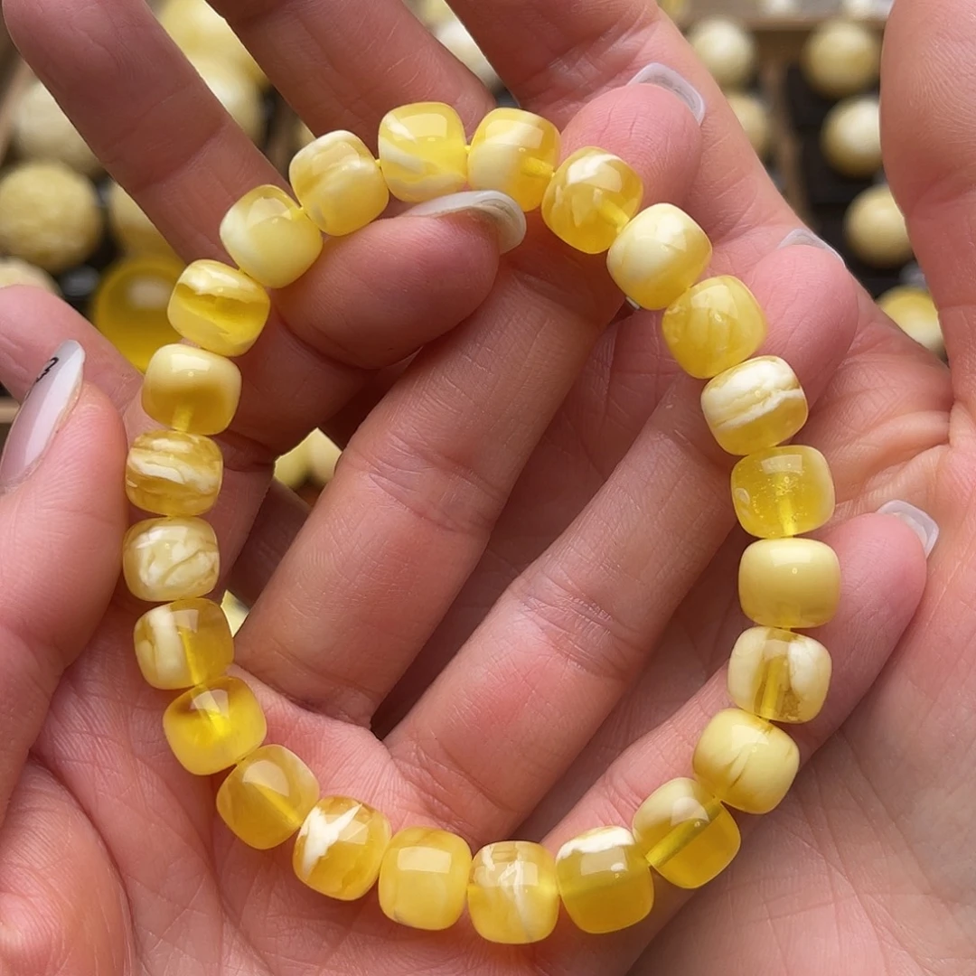 琥珀未镶嵌裸石蜜蜡金白手串微瑕鸽