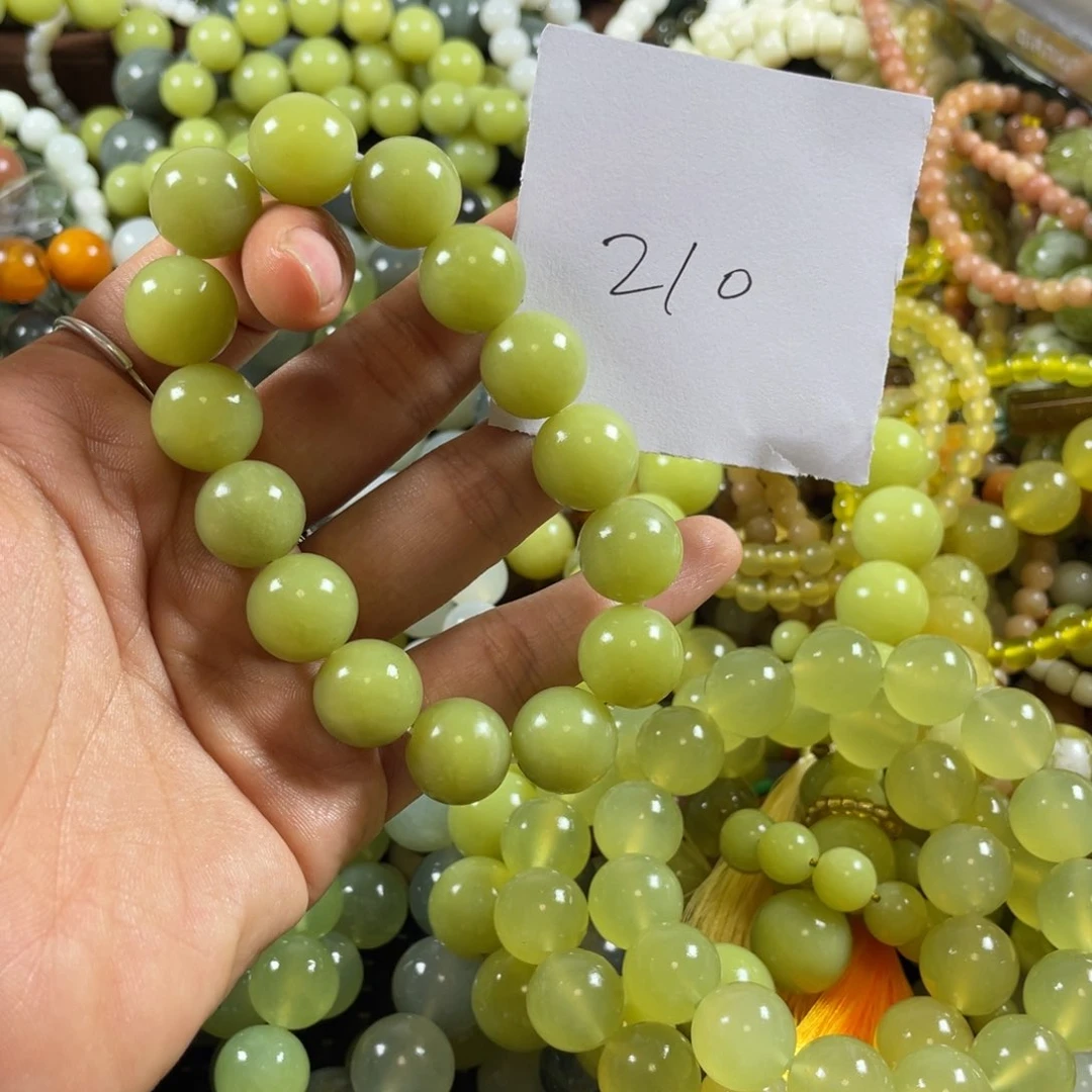 祥***云未镶嵌蛇纹石玉手串