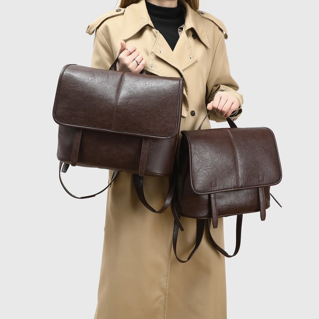 手提背包女2025新款小众复古邮差旅行包高级感百搭通勤休闲双背包