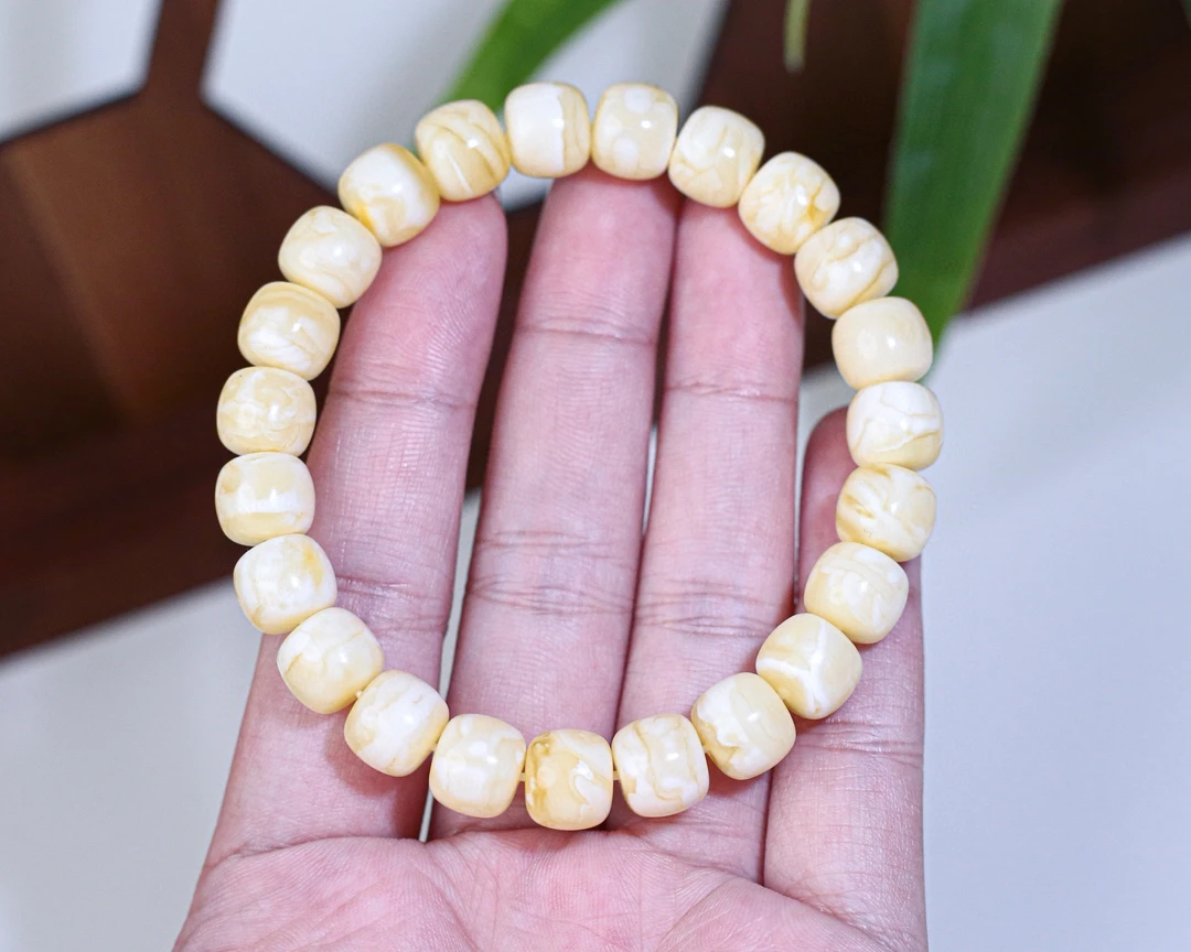 13.71 9.9*8.6 琥珀蜜蜡橘底白花蜡老型手串 花纹细腻，蜡质浓润