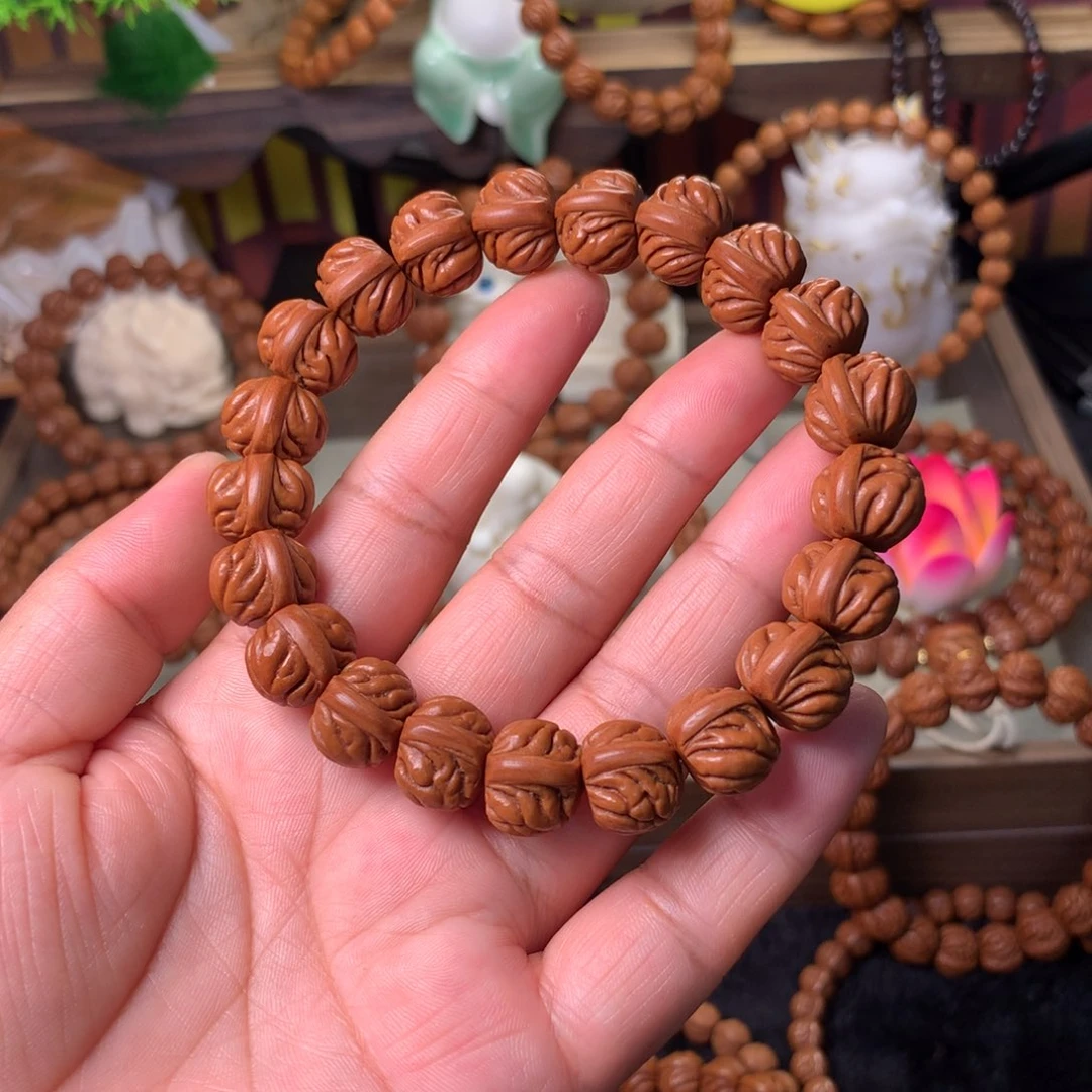 渊***爻桃核吊坠双脊龙手串14