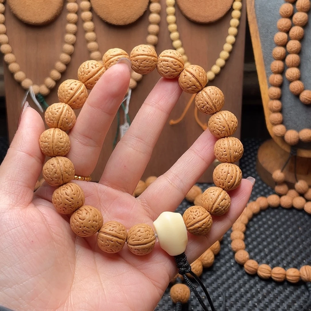 用***414野生灯笼桃核手持