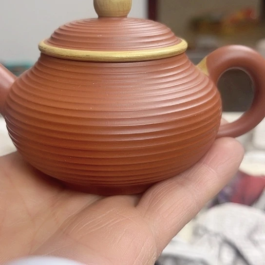 紫砂茶壶是的……是个很