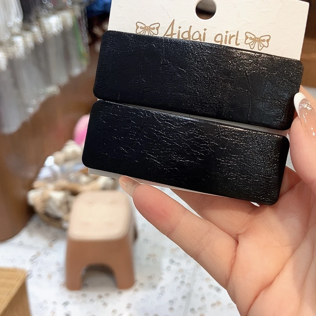 布艺铁合金黑色皮质掰掰夹