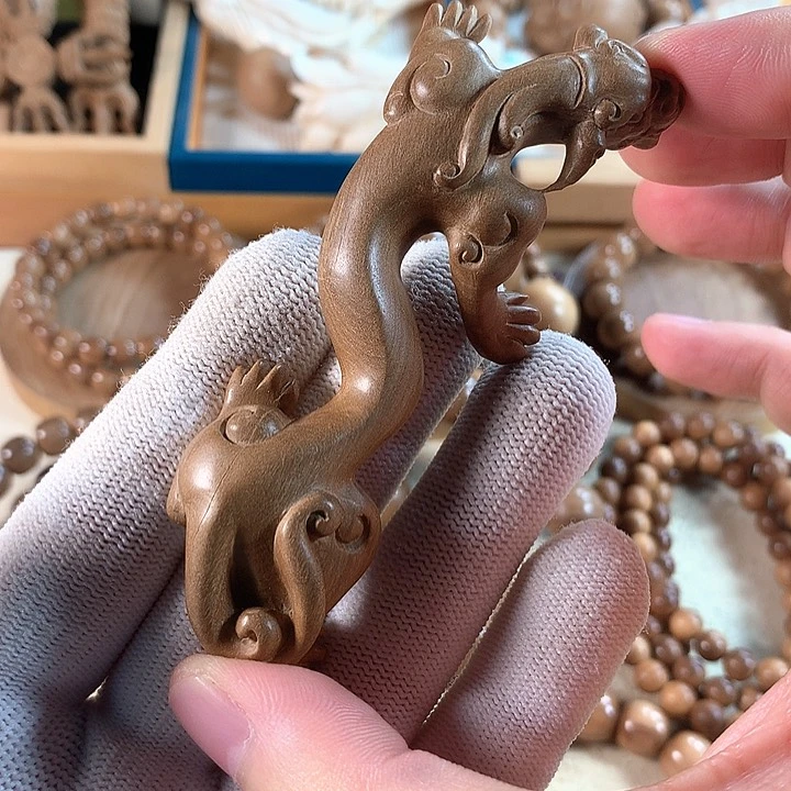 星***轩檀香木把件纯手工螭龙手把件