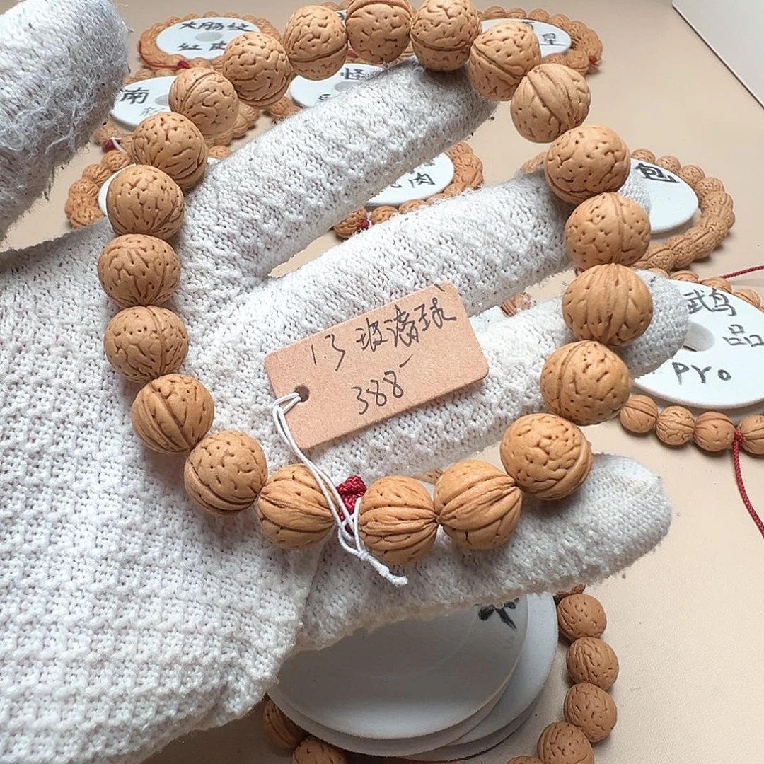 十***九手串桃核1.3玻璃球大宽脐