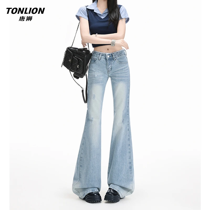 唐狮美式浅蓝微喇叭牛仔裤女新款蕾丝拼接设计感窄版低腰马蹄裤子