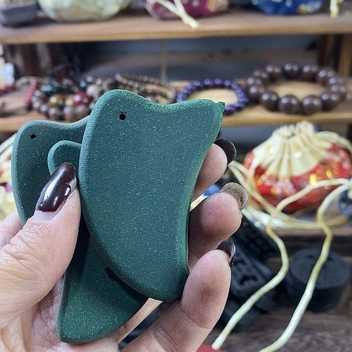 泥塑瑕疵梦灵刮痧板