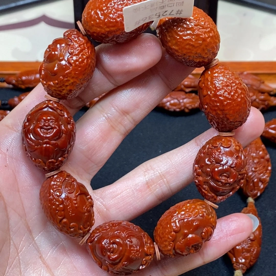 M***l橄榄核吊坠包衣弥勒