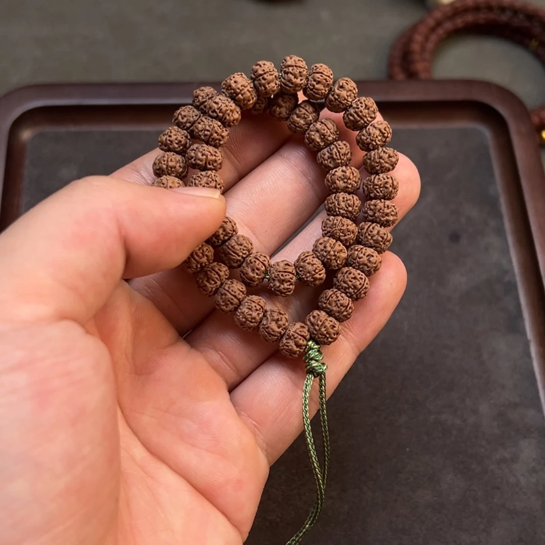 橘***宝金刚菩提吊坠平细